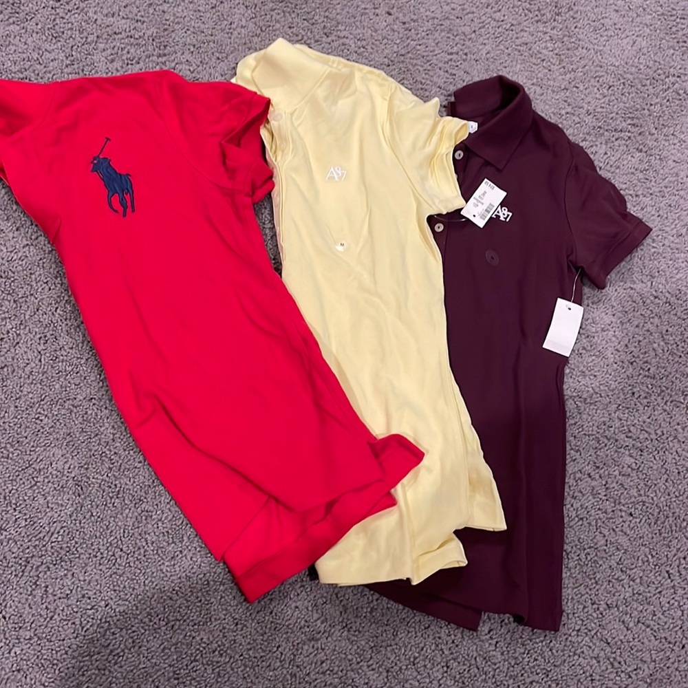 Three polo shirts